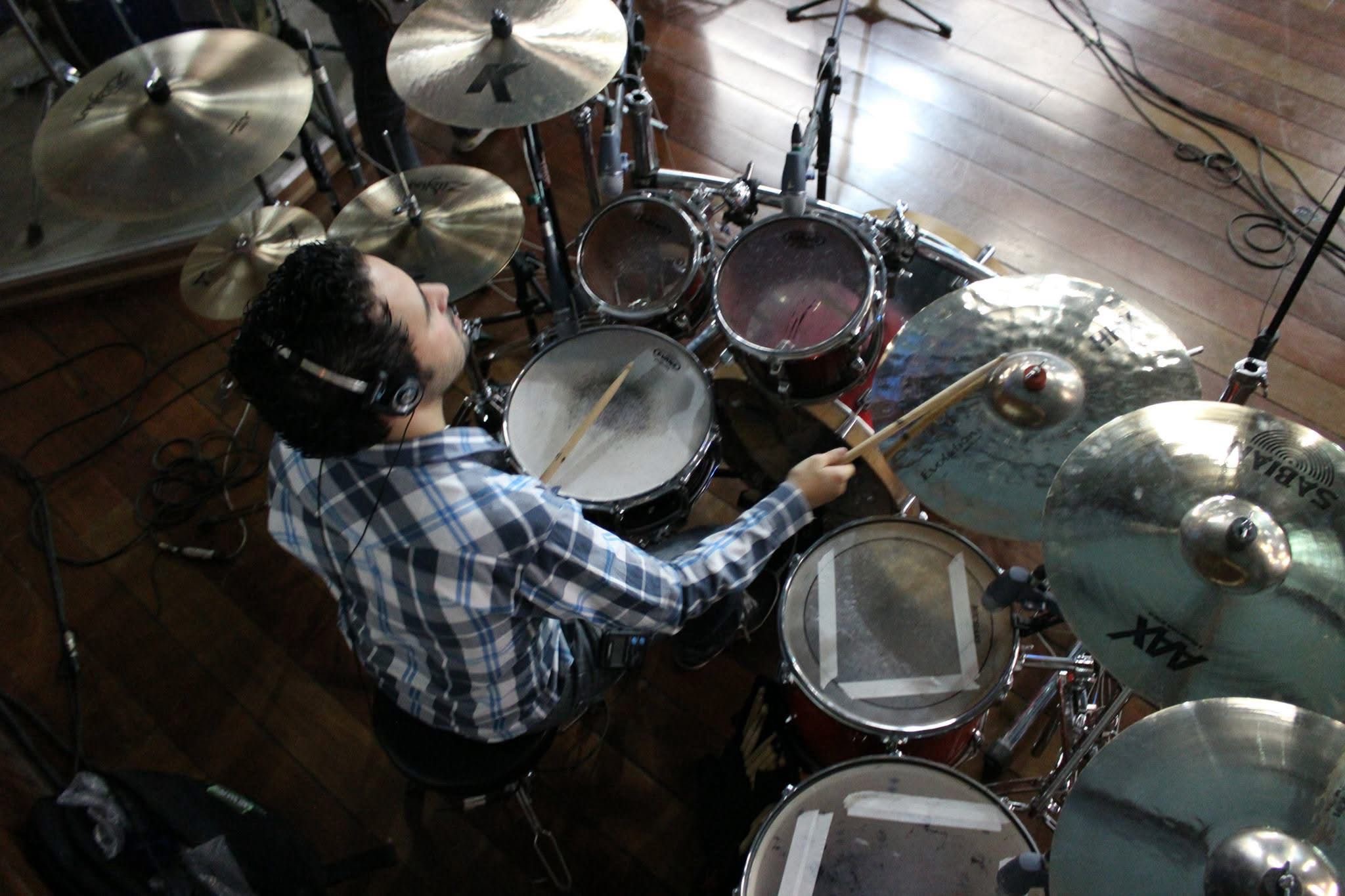 GS music teacher playing drum kit at GS Music Lessons Noosa