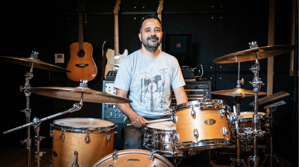 Gustavo Soares performing drums for Morning Jazz Noosa at GS Music Lessons’ event promo.