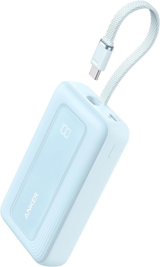 Compact Anker portable power bank for charging phones at music festivals